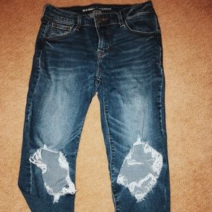 mid rise, knee ripped skinny jeans